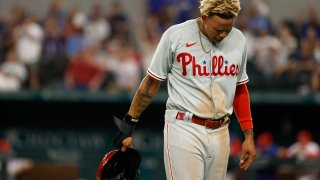 Yairo Munoz looks down while in Phillies uniform