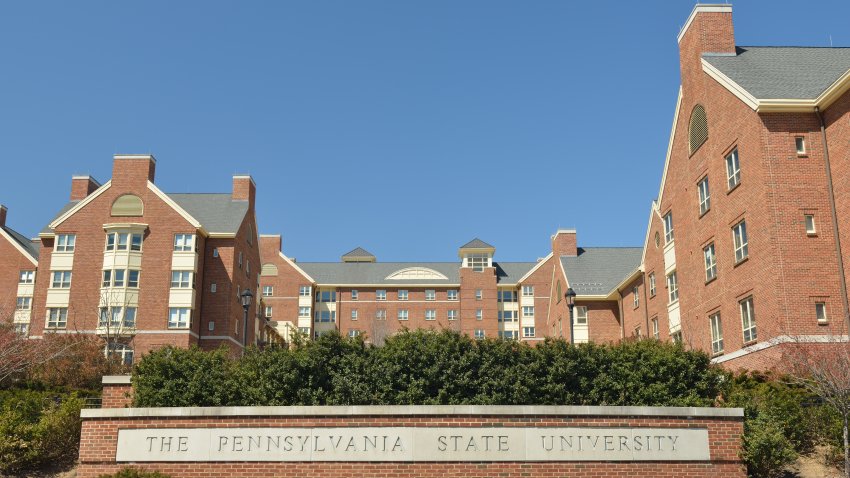 Penn State University sign and brick buildings