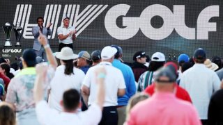 (L-R) Majed Al Sorour, CEO of Saudi Golf Federation, and Greg Norman, CEO and commissioner of LIV Golf, clap during the trophy ceremony during day three of the LIV Golf Invitational – Portland at Pumpkin Ridge Golf Club on July 2, 2022 in North Plains, Oregon.