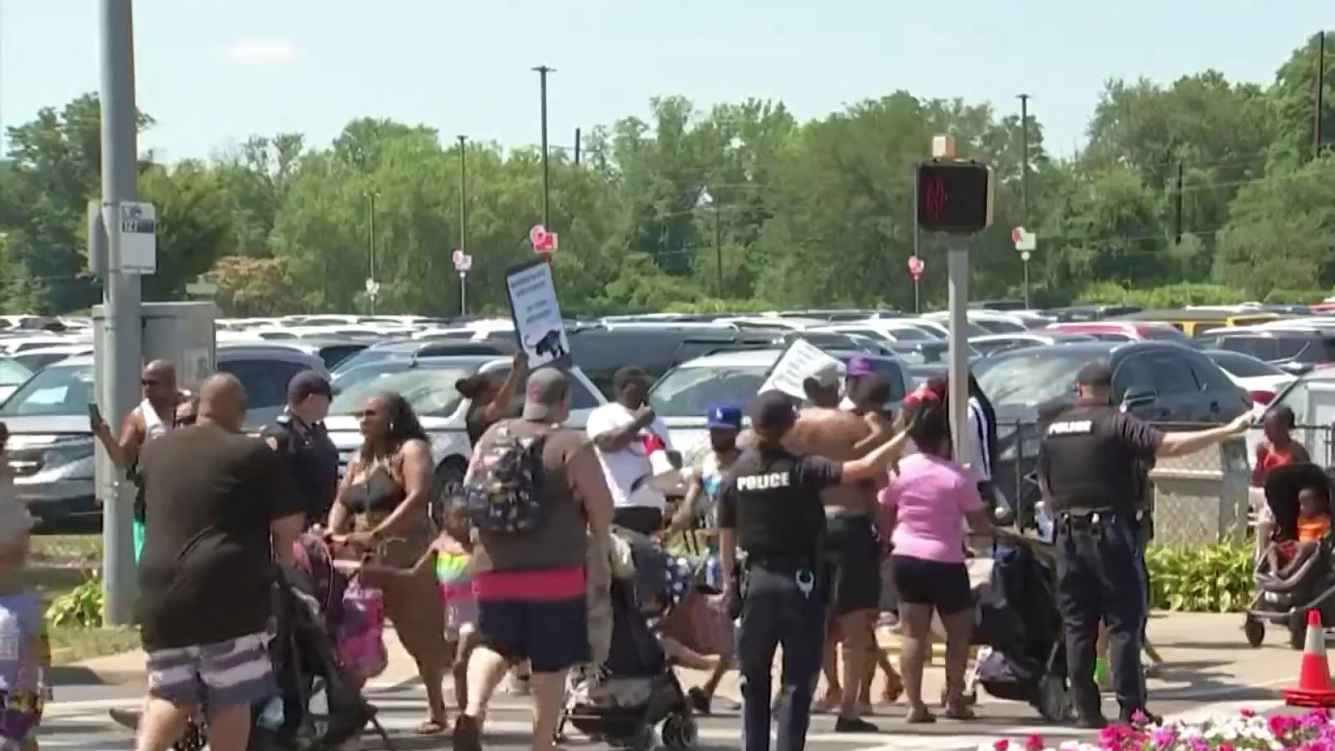 Protests outside Comerica Park, pushing to allow for more fans in the stands