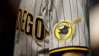 The San Diego Padres logo on the jersey of a Padres player during the MLB game between the Arizona Diamondbacks and San Diego Padres.