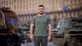 Ukraine’s President Volodymyr Zelenskyy stands at Independence Square as he congratulates Ukrainians on Independence Day, amid Russia’s attack on Ukraine, in Kyiv, Ukraine, in this handout picture released August 24, 2022.