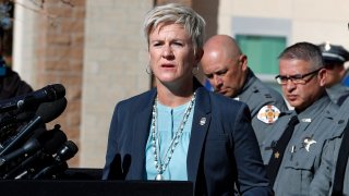 Santa Fe District Attorney Mary Carmack-Altwies speaks during a news conference in Santa Fe, N.M.