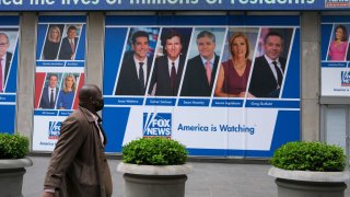 A person walks past Fox News Headquarters at the News Corporation building on May 03, 2022 in New York City.