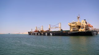 A ship sails on the Suez Canal in Ismailia Province, Egypt, on May 17, 2022. Egypt announced on Saturday that transit fees for all types of vessels passing through the Suez Canal will be increased in 2023. (Photo by Sui Xiankai/Xinhua via Getty Images)