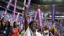 Pennsylvania delegate Cherelle Parker cheers for Michelle Obama on the floor of the Wells Fargo Center in Philadelphia, Pa., on the first day of the Democratic National Convention, July 25, 2016. (Photo By Tom Williams/CQ Roll Call)