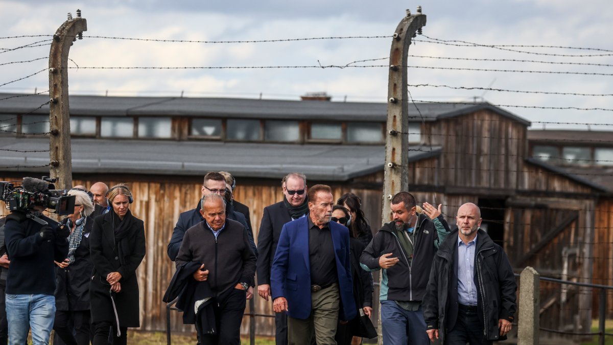 Arnold Schwarzenegger Visits Auschwitz in Message to 'Terminate' Hatred