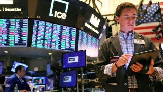 Traders work on the floor of the New York Stock Exchange during morning trading on September 06, 2022 in New York City.