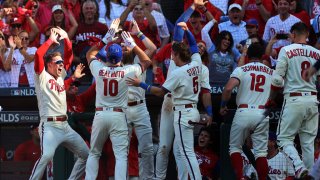 PHILADELPHIA, PENNSYLVANIA – OCTOBER 15: J.T. Realmuto #10 of the Philadelphia Phillies celebrates an in the park home run against the Atlanta Braves during the third inning in game four of the National League Division Series at Citizens Bank Park on October 15, 2022 in Philadelphia, Pennsylvania. (Photo by Tim Nwachukwu/Getty Images)