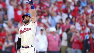 PHILADELPHIA, PENNSYLVANIA – OCTOBER 15: Bryce Harper #3 of the Philadelphia Phillies celebrates a home run against the Atlanta Braves during the eighth inning in game four of the National League Division Series at Citizens Bank Park on October 15, 2022 in Philadelphia, Pennsylvania. (Photo by Patrick Smith/Getty Images)