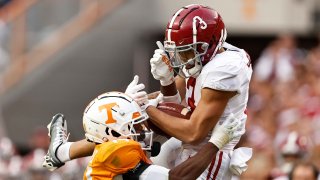 Alabama wide receiver Jermaine Burton (3) makes a catch as he’s defended by Tennessee defensive back Christian Charles (14) during the second half of an NCAA college football game Saturday, Oct. 15, 2022, in Knoxville, Tenn.