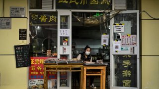 This restaurant, along with many others in Beijing’s business district of Chaoyang, had to suspend dine-in services over the weekend as Covid infections soared.