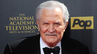 FILE - Actor John Aniston arrives for The 42nd Annual Daytime Emmy Awards held at Warner Bros. Studios on April 26, 2015, in Burbank, California.