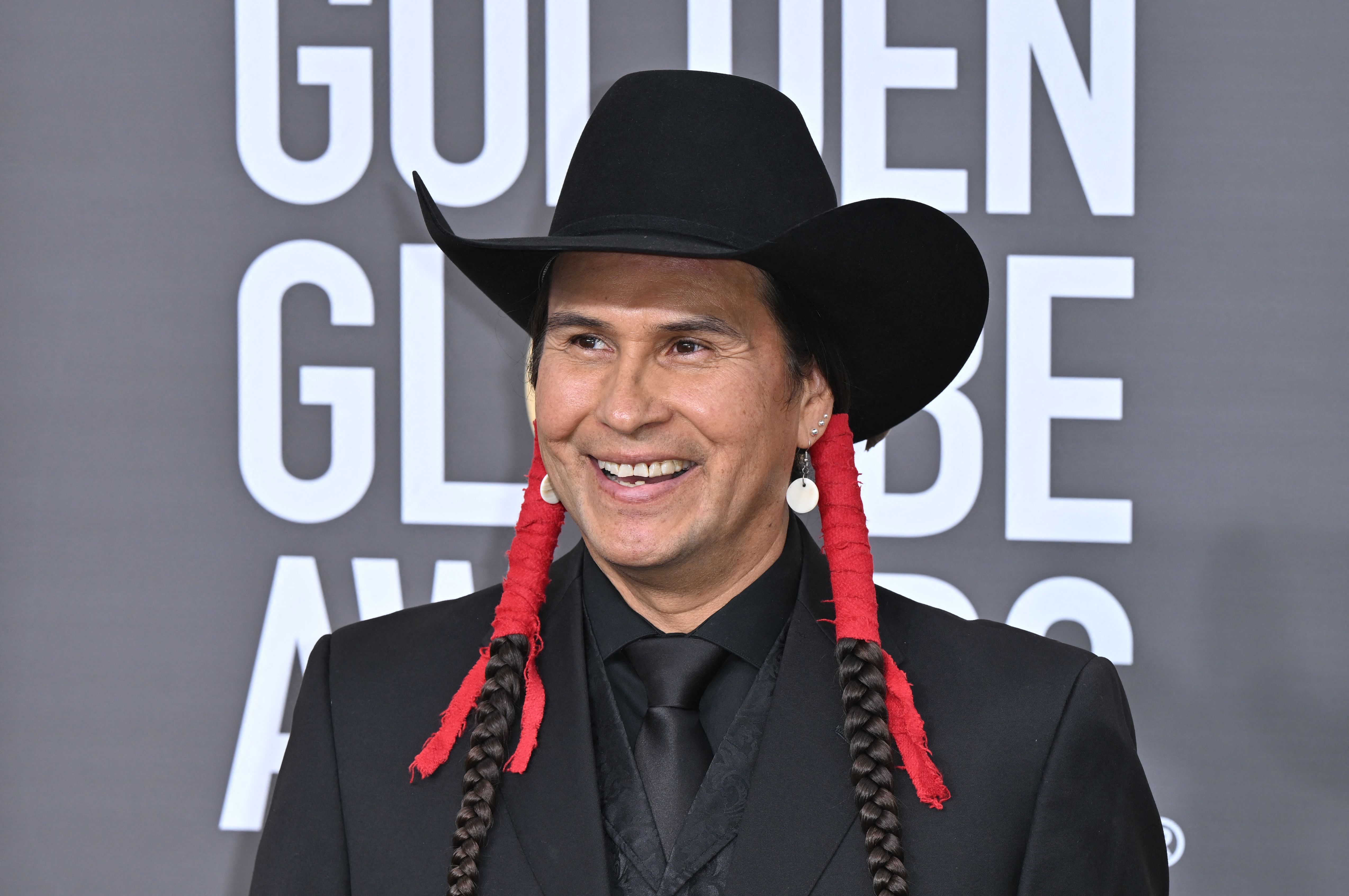 Oglala Lakota actor Mo Brings Plenty arrives for the 80th annual Golden Globe Awards at The Beverly Hilton hotel in Beverly Hills, California, on Jan. 10, 2023.