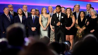 Buffalo Bills’ Damar Hamlin speaks in front of University of Cincinnati Medical Center staff during the NFL Honors award show ahead of the Super Bowl 57 football game,Thursday, Feb. 9, 2023, in Phoenix.