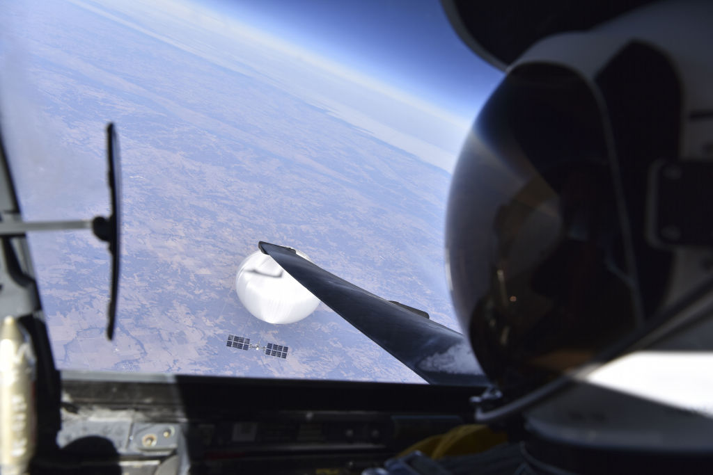 U.S. Air Force pilot looks down at the suspected Chinese surveillance balloon as it hovered over the Central Continental, United States February 3, 2023. 