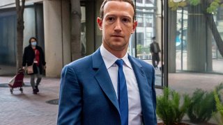 Mark Zuckerberg, chief executive officer of Meta Platforms Inc., left, arrives at federal court in San Jose, California, US, on Tuesday, Dec. 20, 2022.