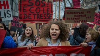 Protestors, including students, chant as they march through the streets of Paris, as thousands take to the streets across France and strike in protest at the French Government’s proposal to increase the retirement age in France from 62 to 64 on March 7, 2023 in Paris. A series of national rolling strikes is seeing workers in transport, education, energy and the health service striking.