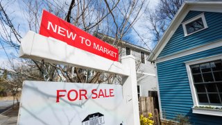 A “For Sale” sign outside of a home in Atlanta, Georgia, on Friday, Feb. 17, 2023.
