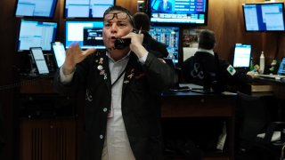 A trader works on the floor during morning trading at the New York Stock Exchange (NYSE) on March 10, 2023 in New York City.