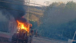 This image provided by the Atlanta Police Department shows construction equipment set on fire, March 4, 2023, by a group protesting a planned police training center, according to police.