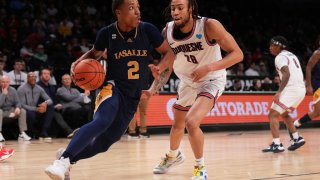 NEW YORK, NEW YORK – MARCH 08:Jhamir Brickus #2 of the La Salle Explorers drives to the net against Duquesne Dukes in the first half during the Second Round of the A10 Basketball Tournament at Barclays Center on March 08, 2023 in Brooklyn, New York. (Photo by Mike Stobe/Getty Images)