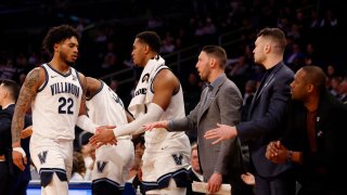 NEW YORK, NEW YORK – MARCH 08: Cam Whitmore #22 of the Villanova Wildcats high-fives the bench after coming out of the game during the second half against the Georgetown Hoyas in the first round of the Big East Basketball Tournament at Madison Square Garden on March 08, 2023 in New York City. The Wildcats won 80-48. (Photo by Sarah Stier/Getty Images)