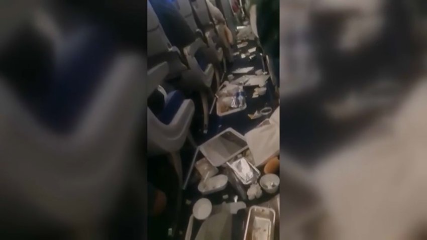 The aftermath of severe turbulence that forced a flight to divert to Dulles International Airport.