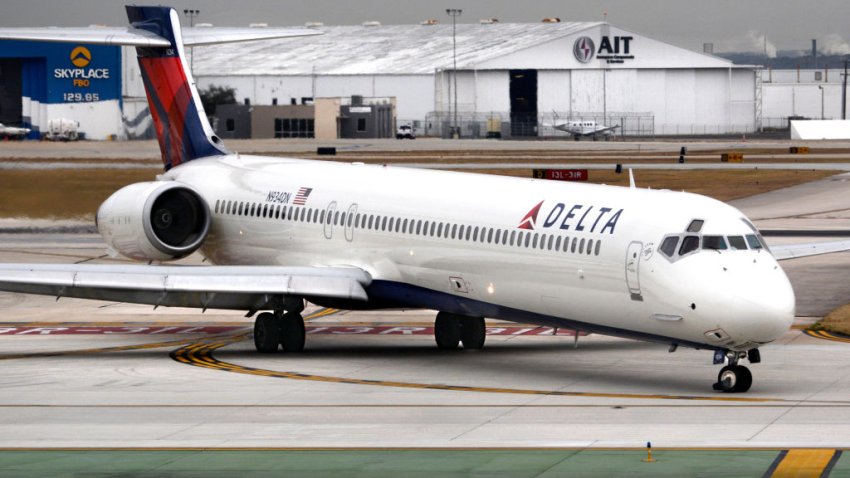 A Delta Airlines McDonnell Douglas MD-90 passenger jet taxis after landing at San Antonio International Airport in Texas.