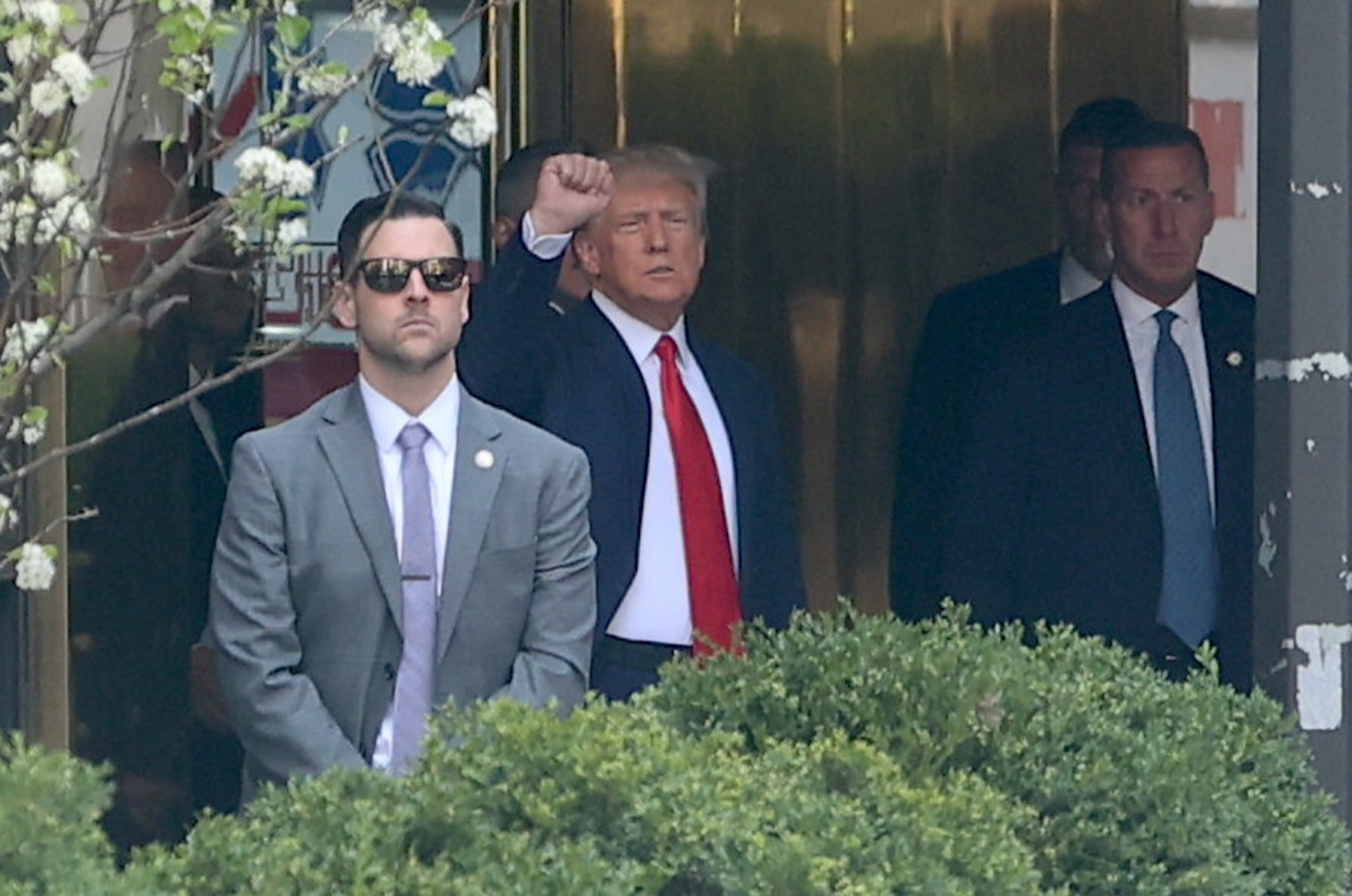 Former U.S. President Donald Trump departs Trump Tower as he heads to an arraignment hearing on April 4, 2023, in New York City.