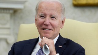 President Joe Biden listens as he meets with Colombian President Gustavo Petro in the Oval Office of the White House in Washington, April 20, 2023.