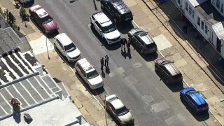 Officers investigate after a 5-year-old was shot on the porch of a home in Philadelphia's Olney neighborhood.