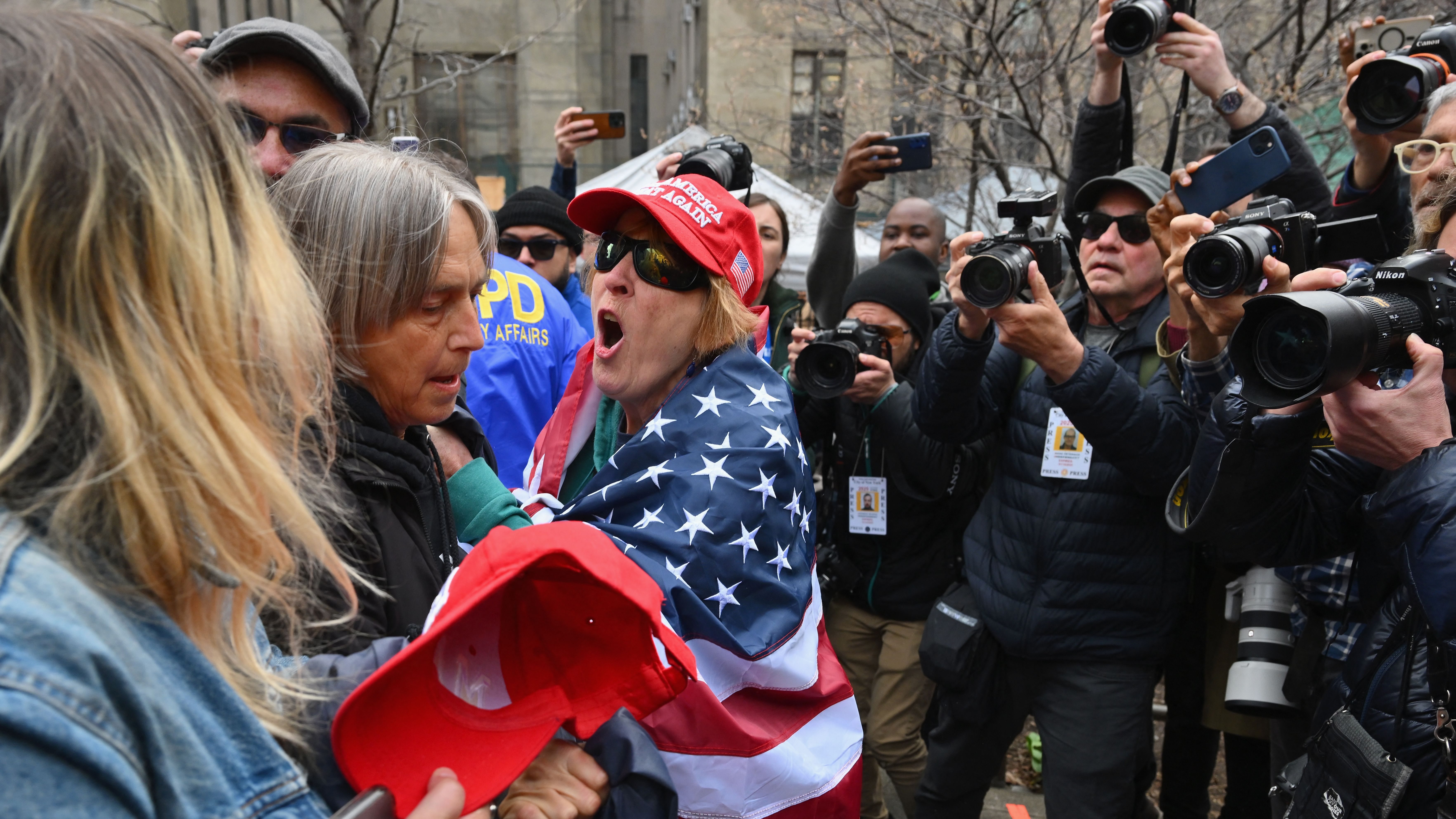 Pro and anti Trump supporters face off during a protest outside of Manhattan Criminal Court in New York City on April 4, 2023.