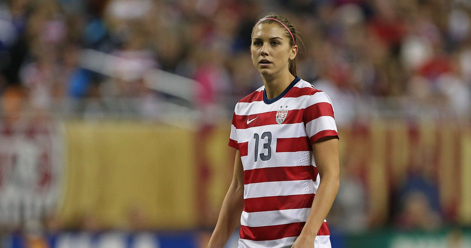 DETROIT, MI - DECEMBER 08:  Alex Morgan #13 of Team USA looks for the pass during the game against China at Ford Field on December 8, 2012 in Detroit, Michigan. USA defeated China 2-0.  (Photo by Leon Halip/Getty Images)