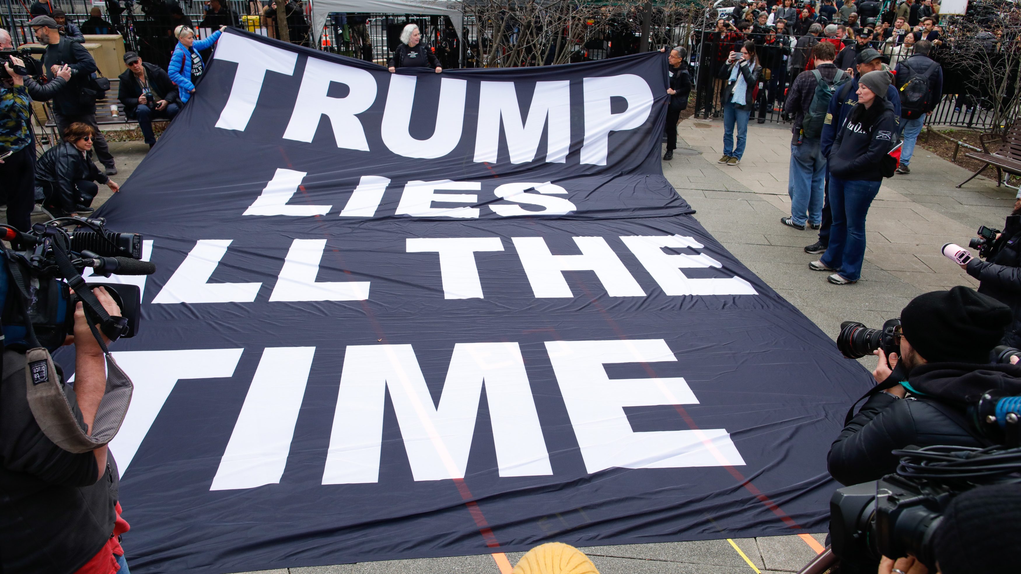 Anti-Trump protestors gather outside the Manhattan Criminal Courthouse on April 04, 2023 in New York City.