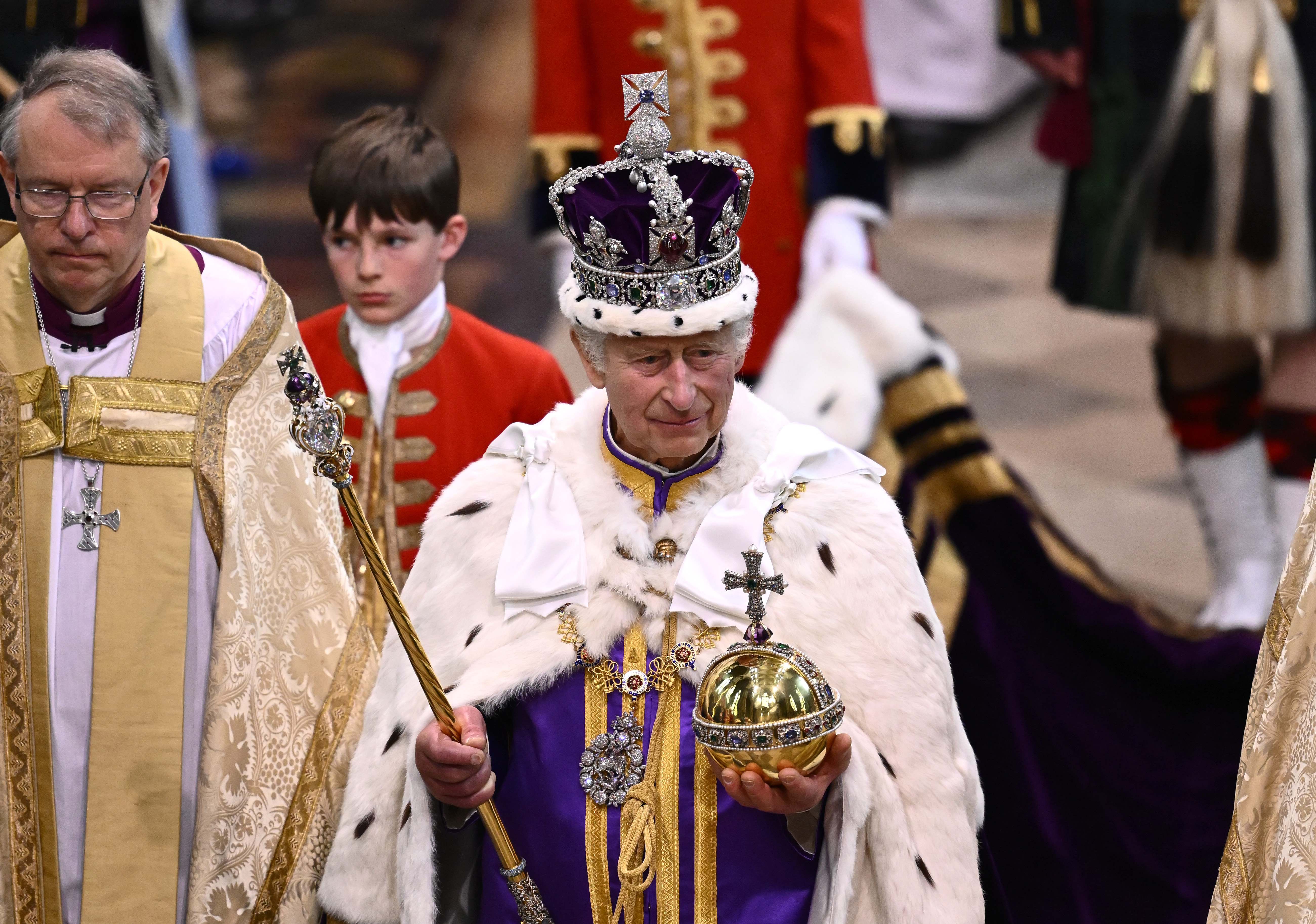 King Charles III departs the Coronation service at Westminster Abbey on May 6, 2023 in London, England.