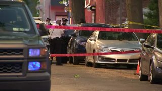 Police investigate a shooting along North Robinson Street in West Philadelphia that left a man dead.