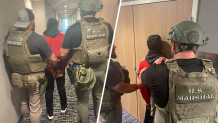 Photos of U.S. Marshals arresting Michael Abrams.