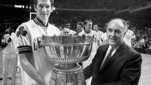 Caption: BOSTON - 1969: NBA President Walter Kennedy and John Havlicek of the Boston Celtics pose with the Walter Brown Memorial trophy circa 1969 at the Boston Garden in Boston, Massachusetts. NOTE TO USER: User expressly acknowledges that, by downloading and or using this photograph, User is consenting to the terms and conditions of the Getty Images License agreement. Mandatory Copyright Notice: Copyright 1969 NBAE (Photo by NBA Photo Library/NBAE via Getty Images)