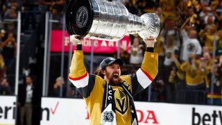 Mark Stone celebrates with the Stanley Cup after the Vegas Golden Knights won the NHL Stanley Cup Final against the Florida Panthers at T-Mobile Arena in Las Vegas, June 13, 2023.