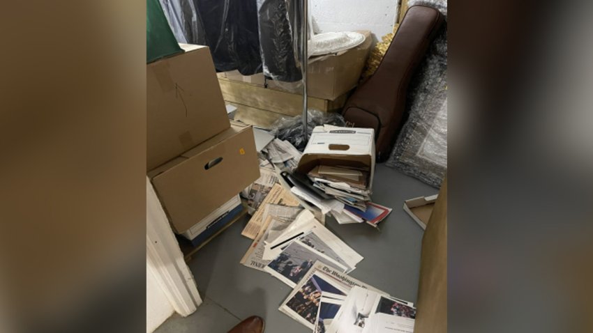 Some of the boxes in the storage room had fallen and spilled on the floor, including a document classified only for Australian, Canadian, New Zealand, United Kingdom and United States intelligence.