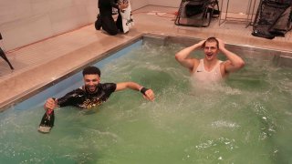 Nikola Jokic #15 of the Denver Nuggets and Jamal Murray #27 of the Denver Nuggets celebrate in the locker room after winning Game Five of the 2023 NBA Finals on June 12, 2023 at Ball Arena in Denver, Colorado.