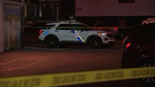 Officers respond after a woman was killed in a shooting in Northeast Philadelphia early Saturday.