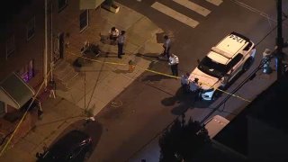 Officers investigate after a man was killed in Philadelphia's Point Breeze neighborhood on Friday night.