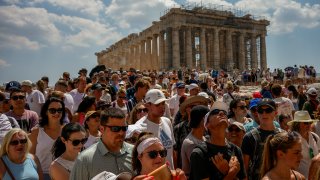 Tourists visit the Parthenon temple