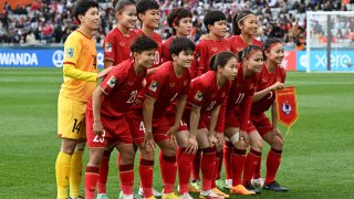 Vietnam’s players pose for a group photo before the Australia and New Zealand 2023 Women’s World Cup Group E football match between the United States and Vietnam at Eden Park in Auckland on July 22, 2023. (Photo by SAEED KHAN/AFP via Getty Images)