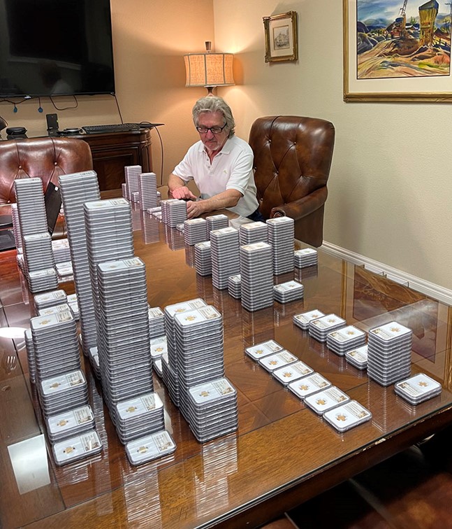 Rare coin dealer Jeff Garrett inspects “The Great Kentucky Hoard" coins. 