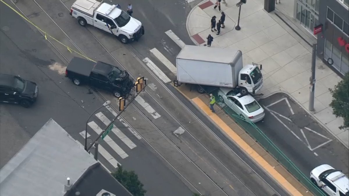 Box truck drives over another vehicle on Girard Avenue in Philadelphia ...