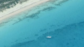 A disabled vessel near Cay Sal, Bahamas, on Friday. The crew of the Coast Guard Cutter Paul Clark rescued the boat's owner and transferred him to the Royal Bahamas Defence Force.