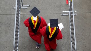 Graduates walk into High Point Solutions Stadium before the start of the Rutgers University graduation ceremony in Piscataway Township, N.J., on May 13, 2018. With the help of a nonprofit that focuses on civic education, the presidents of a wide-ranging group of 13 universities have decided to elevate free speech on their campuses this academic year.